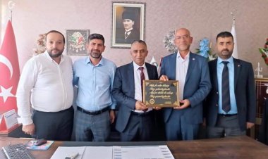 Özcan’dan Başkan Canpolat'a Ziyaret .