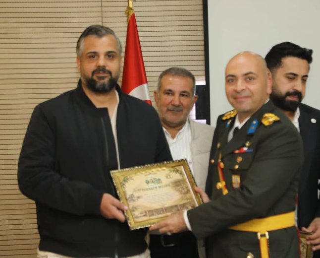 MERHUM NUH YILMAZ’A, NİZİP’İN 100. YILINA KATKILARINDAN DOLAYI TEŞEKKÜR PLAKETİ